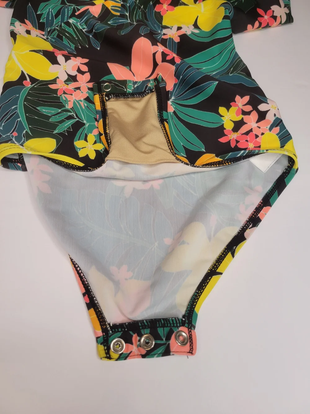 Old Navy toddler girl's long-sleeve, one-piece swimsuit featuring a black floral - Picture 4 of 6